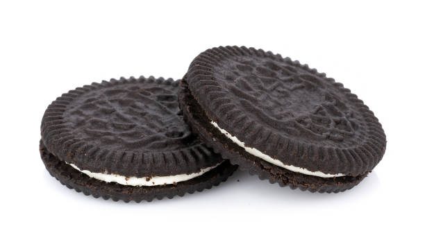 istock sandwich cookies with cream on white background 1133821420