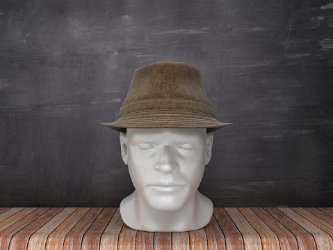 Human Head with Hat on Chalkboard Background - 3D Rendering