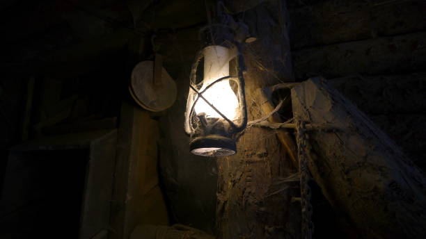 istock Lighted lamp with lots of cobwebs on it 1133822157