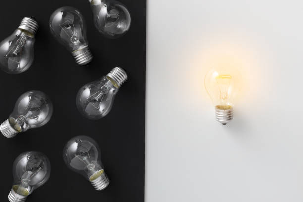 istock Illuminated lamp separated from other on contrast background 1133824026