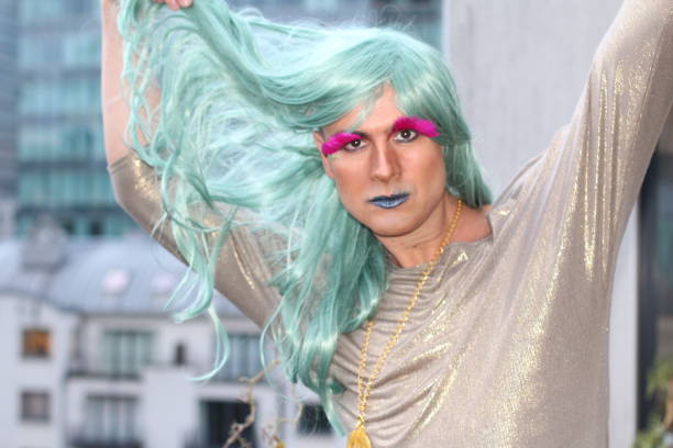 istock Drag queen touching his green wig 1133825682