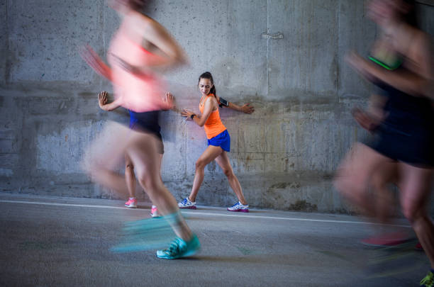 istock Group of Young Girls Exercising Together 1133826078