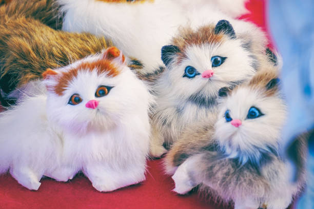 istock Soft toys white kittens sitting in front of camera 1133830868