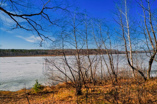 istock early spring, ice melts on the lake 1133831484