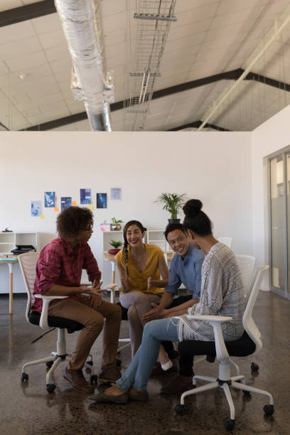 istock Business colleagues interacting with each other in office 1133832257