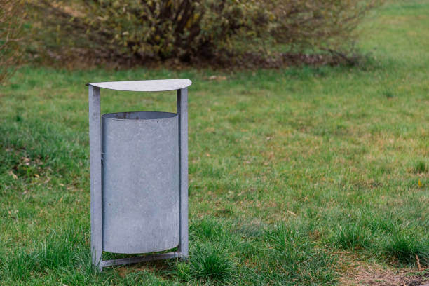 istock Iron urn on the grass in the park 1133832323