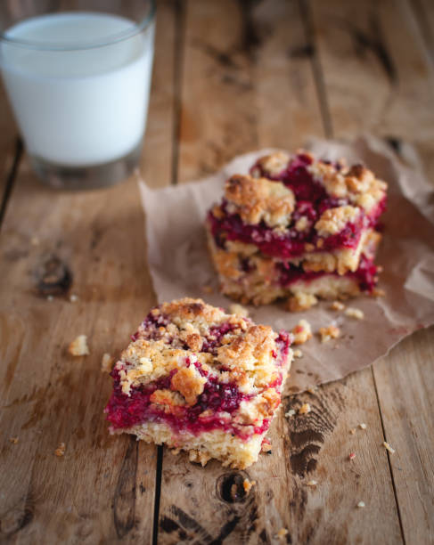 istock Raspberry crumb bars on wooden background 1133832716