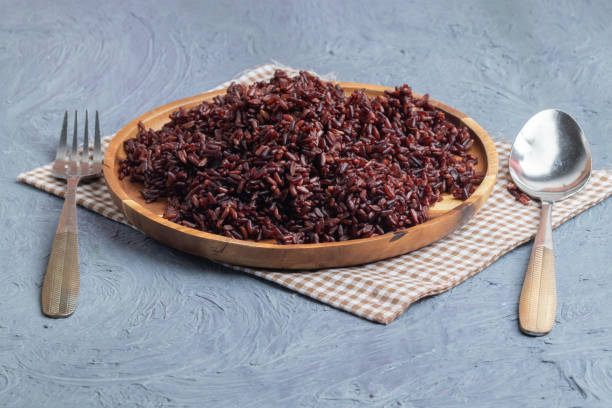 istock close up riceberry rice on wooden plate 1133832848