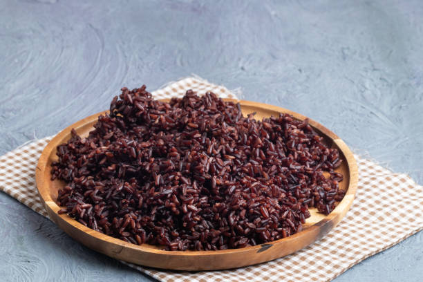 istock close up riceberry rice on wooden plate 1133832864