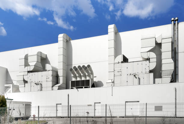 istock Supermarket ventilation system. Large aluminum pipes for ventilation systems. Air purification system for a large children's supermarket 1133832890