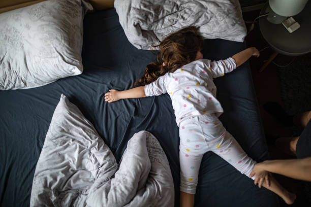 istock Sleeping child in bedroom 1133835977