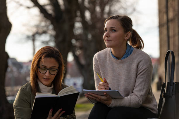 istock Two women studying in the city 1133836330