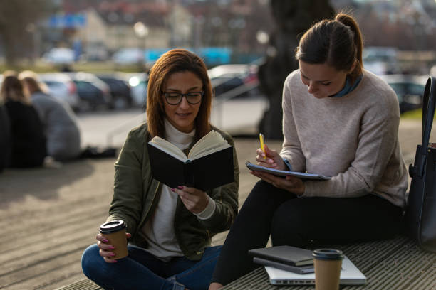 istock Two women studying in the city 1133836366