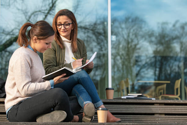 istock Two women studying in the city 1133836395