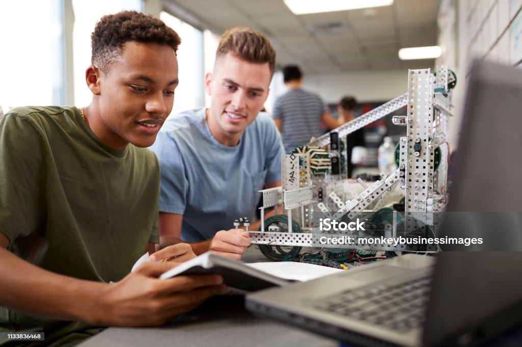Engineering Class Photo Two Male University Students Building Machine In Science Robotics Or ...