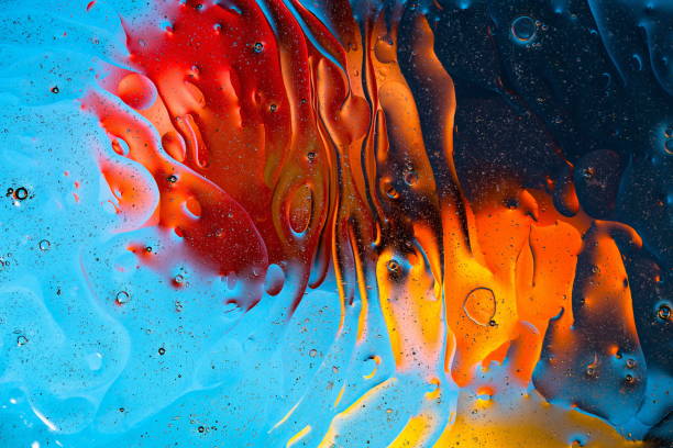 diseño abstracto colorido rojo, anaranjado, azul, amarillo, textura. hermosos fondos. - líquido fotos fotografías e imágenes de stock