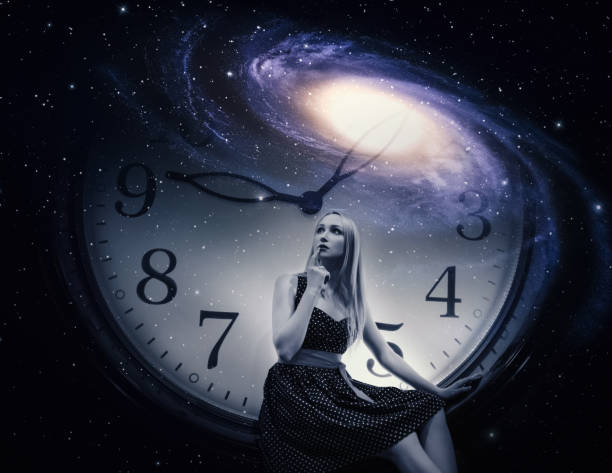 istock Young woman with giant clock and galaxy. 1133837921