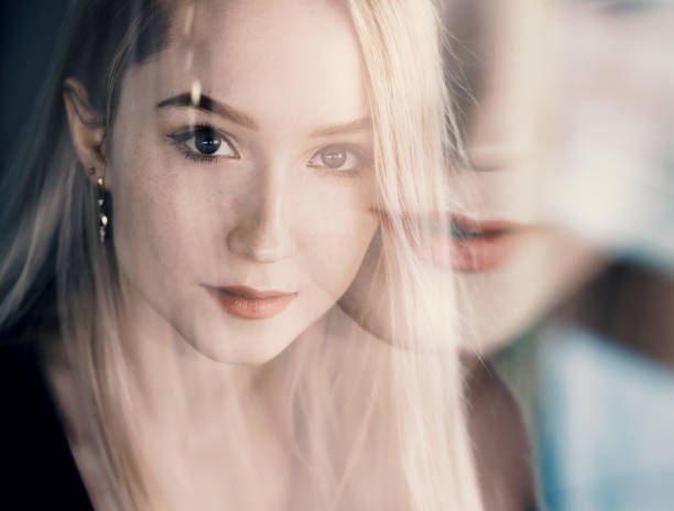 istock Double exposure of young woman. 1133837974