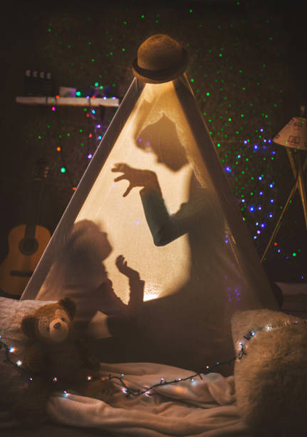 istock Happy kids having party in tent 1133840697