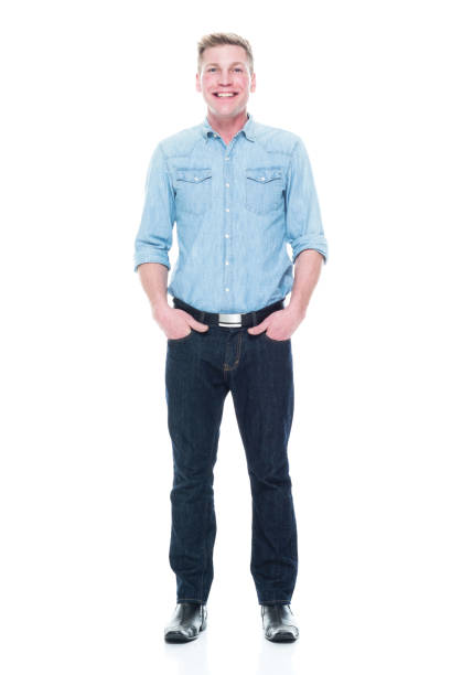 istock Handsome man standing with hand in pockets 1133844142