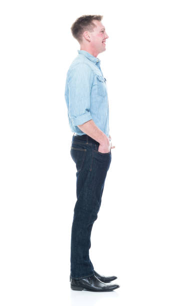 istock Handsome man standing with hand in pockets 1133844146