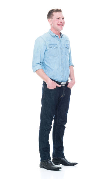 istock Handsome man standing with hand in pockets 1133844149
