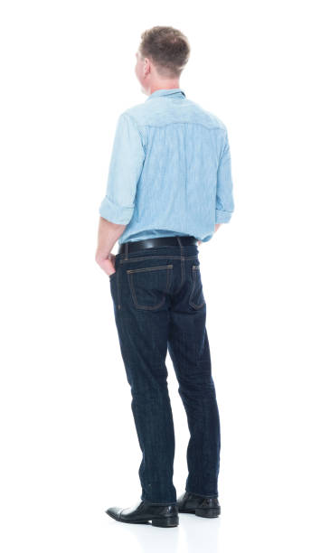 istock Handsome man standing with hand in pockets 1133844165