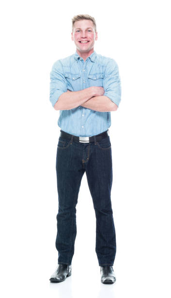 istock Handsome man standing with hands crossed 1133844243