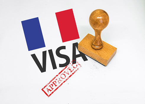 France Visa Approved with Rubber Stamp and flag