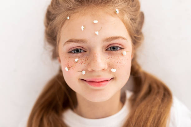 istock Pleasant appealing young lady posing with little flowers 1133845474