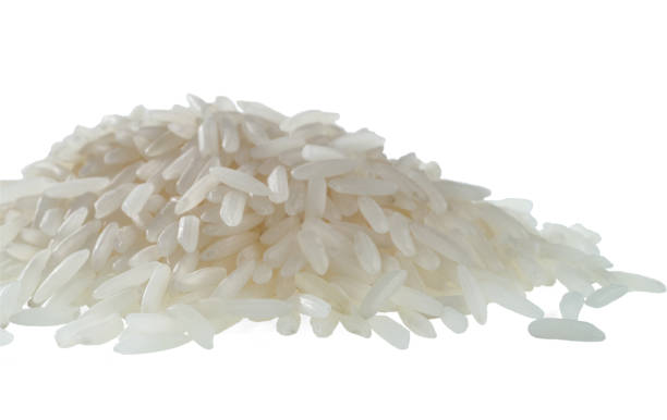 istock A handful of white rice isolated on white background. 1133846226