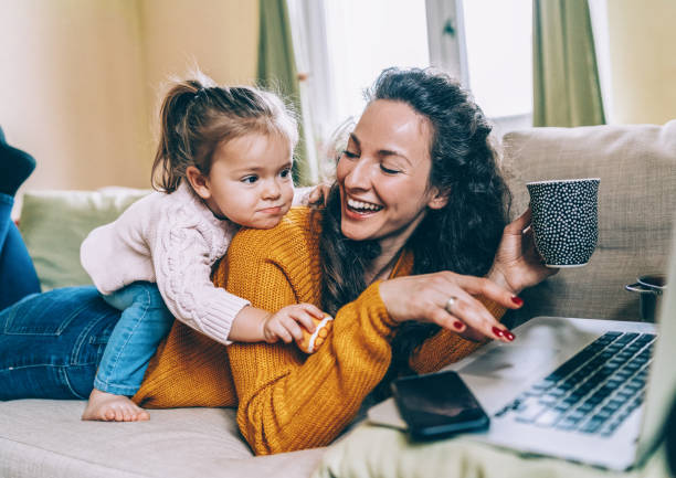 istock Mother and daughter Having fun online 1133846301