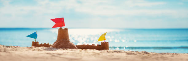 istock Sandcastle on the sea in summertime 1133849927