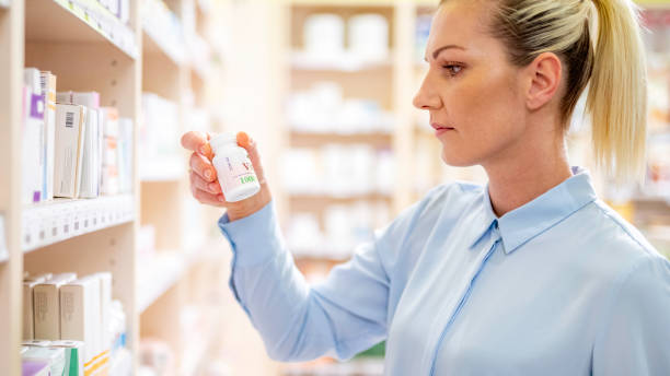 istock Woman shopping at pharmacy 1133851043