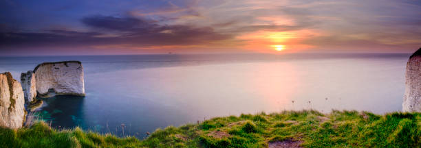 istock Sunrise at Old Harry's Rocks, Studland, Dorset, UK 1133854837