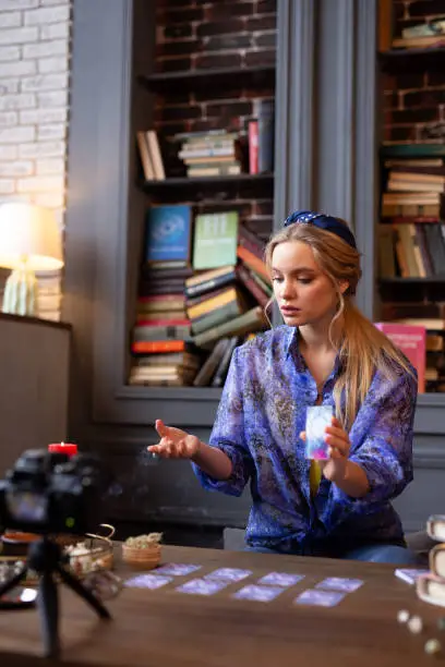 Photo of Nice blonde woman being a fortune teller