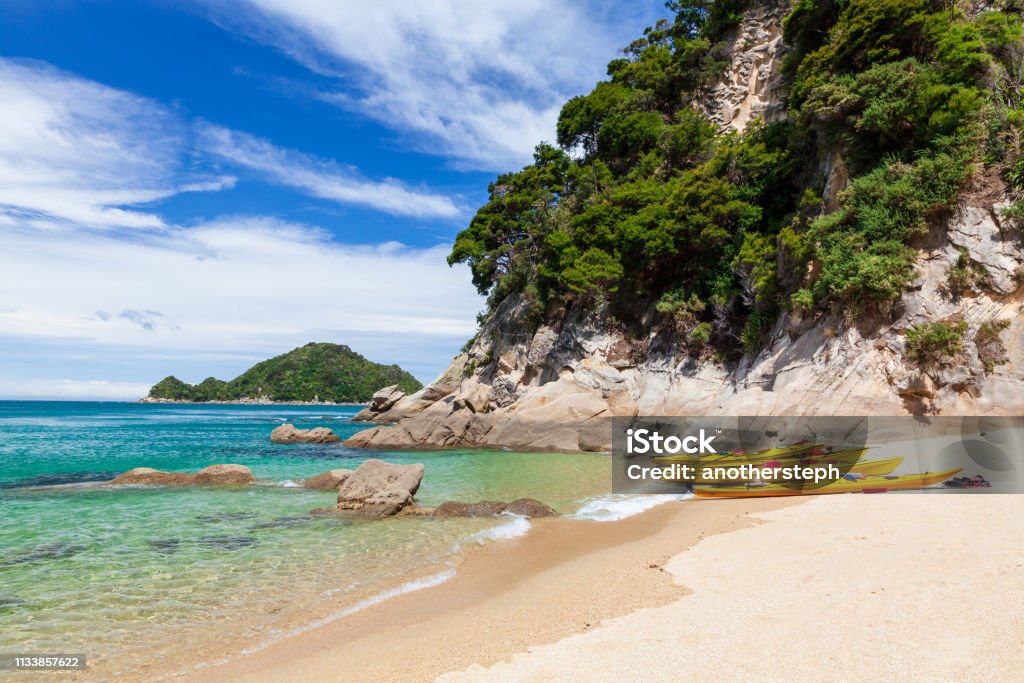 Paradise beach in Abel Tasman National Park, New Zealand Kayaking activity in Abel Tasman national park let the tourists approach desert sand beaches and wonderful islands and coasts covered by native forests New Zealand Stock Photo