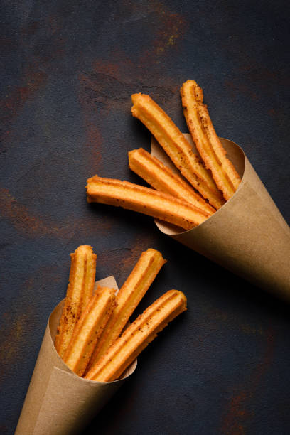 istock Churros sticks fresh hot with cinnamon 1133859174