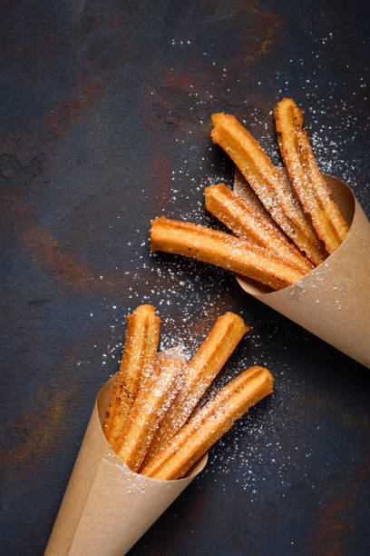 istock Churros sticks fresh hot with sugar powder 1133859219