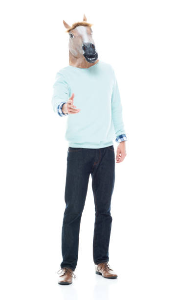 istock Man with horse mask doing a handshake 1133861253