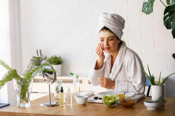 Photo of Woman at home having skin care routine