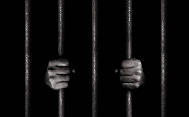 istock Hands of the prisoner 1133862799