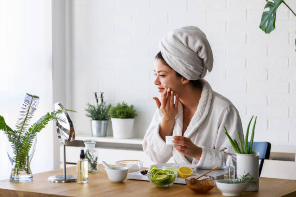 istock Young woman cleaning face with natural cosmetics 1133862801