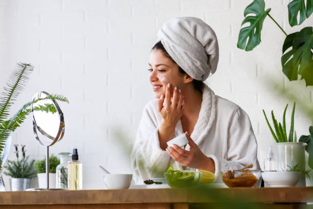 istock Young woman cleaning face with natural cosmetics 1133862924