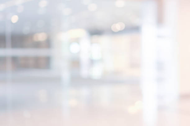 istock abstract blurred modern interior of office hospital background with light form glass reflection building for presentation , banner design 1133863182
