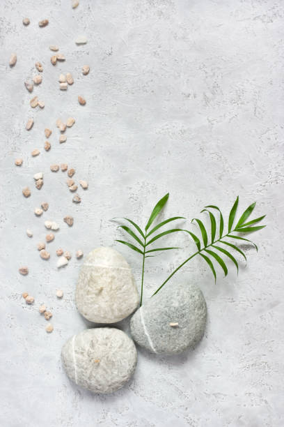 istock Spa stones and leaves on grey background 1133863793