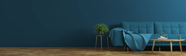 Interior of living room with blue sofa, wooden coffee table, vase with branch panorama 3d rendering Interior of living room with blue sofa, wooden coffee table with vase with branch panorama 3d rendering plaid couch stock pictures, royalty-free photos & images