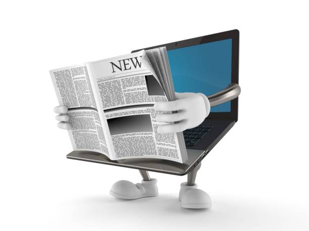 istock Laptop character reading newspaper 1133867798