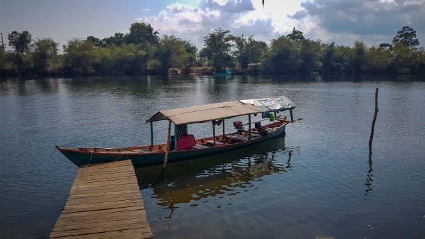 istock Wooden pier in river Cambodia 1133869386