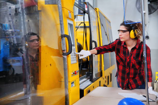 istock Woman working in a factory 1133870377